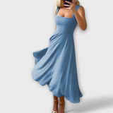 Елегантна безръкава рокля