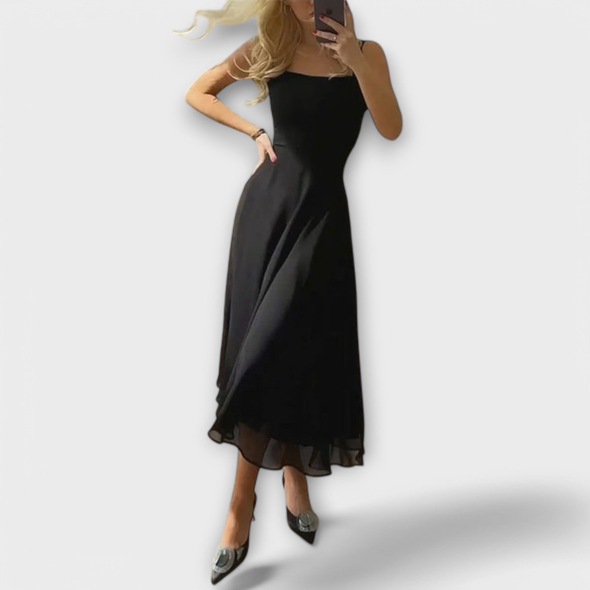 Елегантна безръкава рокля