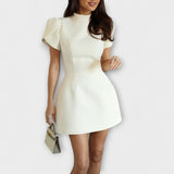 Аврора - Мини рокля без гръб с лък и къси ръкави