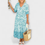 Кейтлин - Елегантна цветна рокля с ефирен дизайн