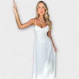 Аланис - Рокля до средата на прасеца